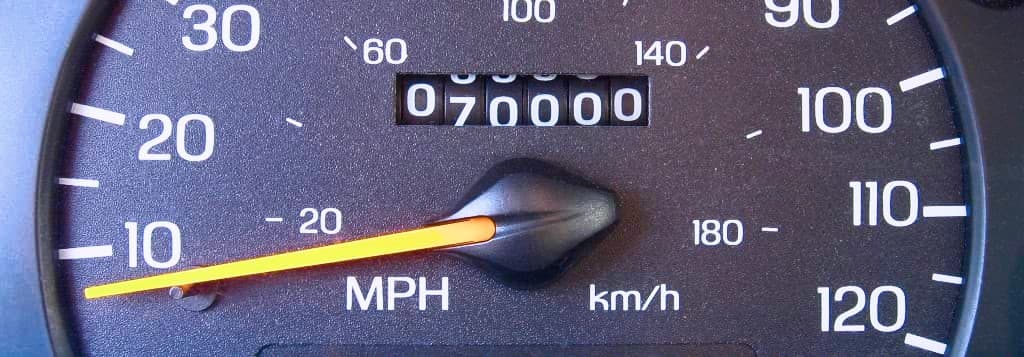 Odometer showing kilometers and miles per hour.